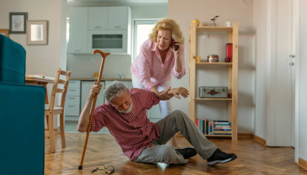 senior  women helping at old man who falled down on floor