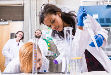 UW Bothell students work in a micro biology lab prepping samples taken from water around campus.