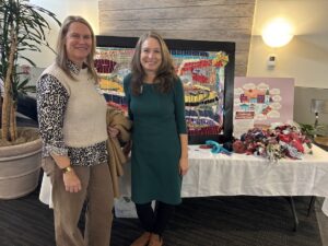 Andrea Yip (Aging King County) and Aimee Verrall (NW GWEC) connecting at the weaving table. 